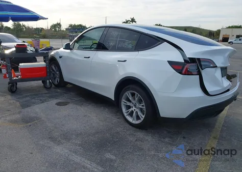 2023 Tesla Model Y Awd/Long Range Dual Motor All-Wheel Drive z USA, uszkodzony, nr VIN 7SAYGDEE3PA123054